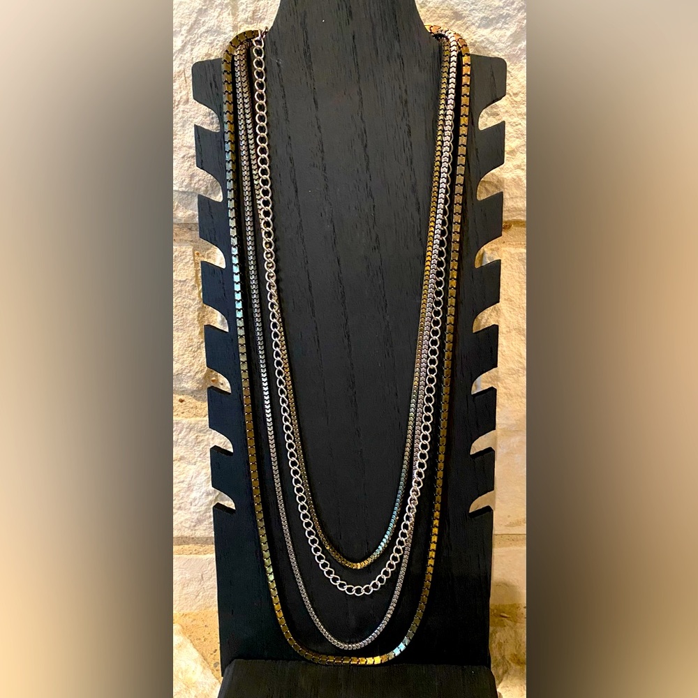 Fun 20” 4 chain necklace with both silver and gold chains. Very sturdy